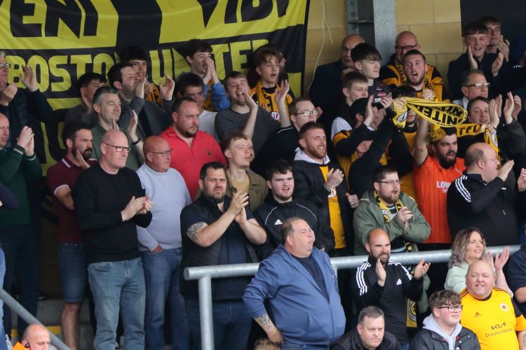 The Boston fans celebrate Danny Elliott scoring