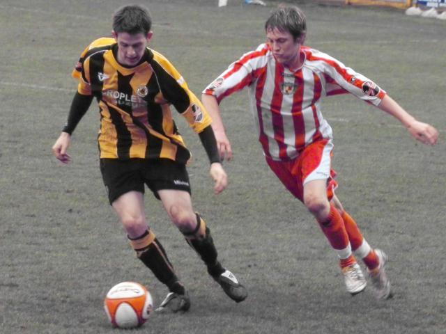 Marc Newsham guards the ball