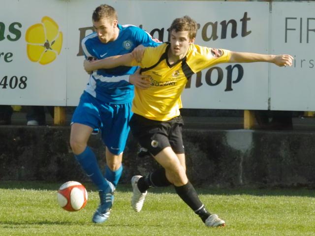 Tom Matthews tussles