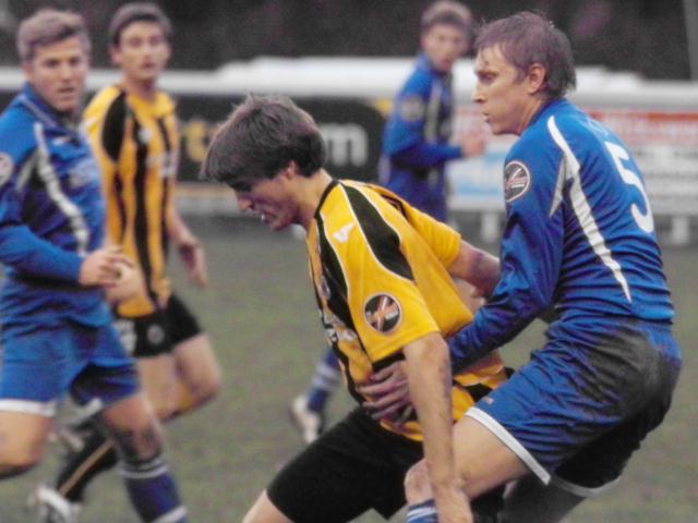 Suarez is closely marked