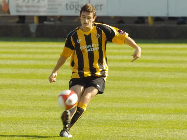 Anthony Church flicks the ball up