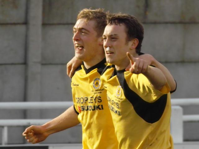 Adam Millson and Ricky Miller celebrate
