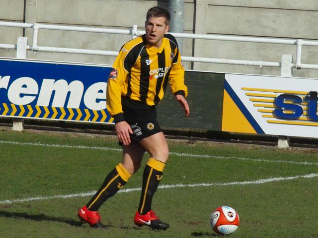 Gareth Davies shiny red boots