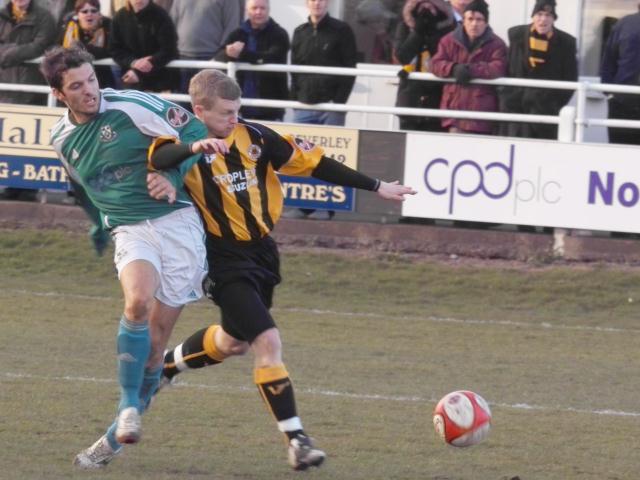 Tom Matthews holds back Jamie Yates