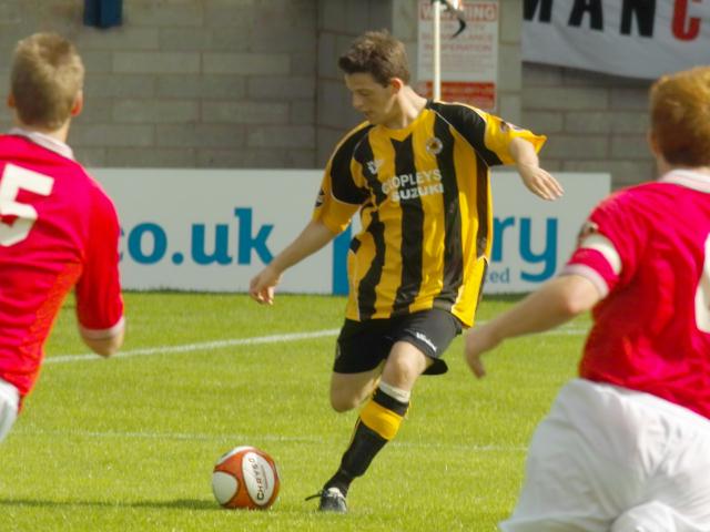 Marc Newsham chips the ball