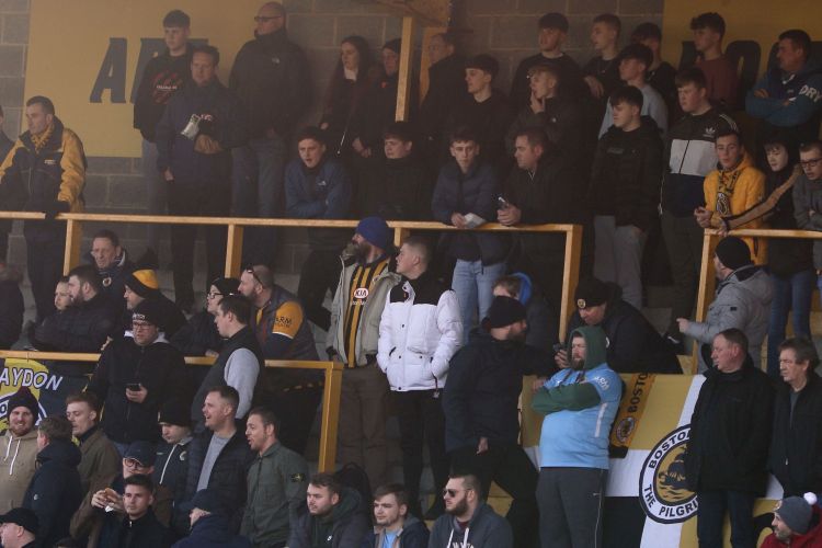 The Town End begins to fill with Boston United fans