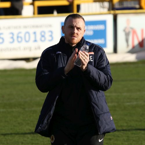 Craig Elliott comes out before the teams